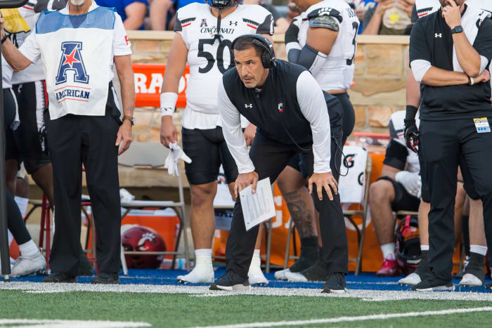 Cincinnati head coach Luke Fickell watching his team from the sidelines